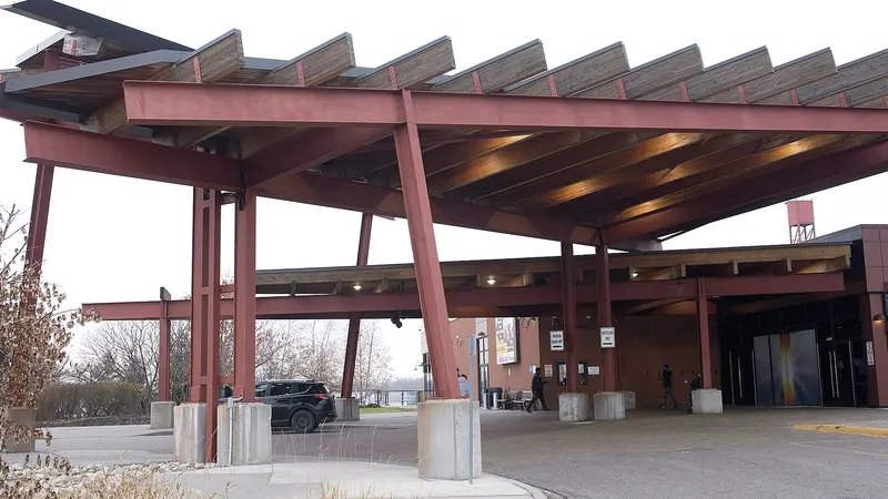 Casino Ajax: the timber-and-steel entrance canopy over the drop-off loop, 2019